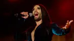 Masih ingat dengan Conchita Wurst? Conchita adalah pemenang kontes menyanyi antar negara Eropa-Eurovision tahun 2014. Conchita Wurst dikenal dengan penampilannya yang mirip sekali dengan wanita tapi berkumis lebat.  (AP/Christian Bruna)