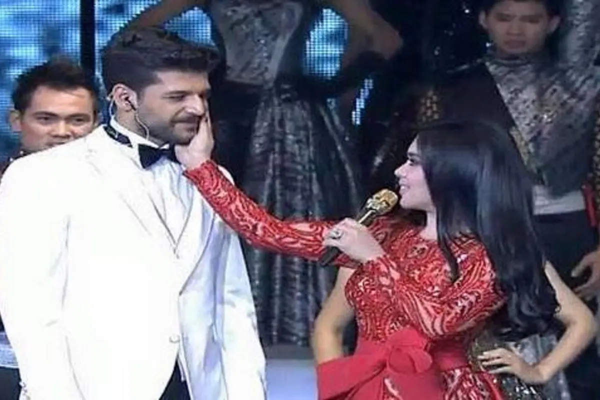 Syahrini bersama Emre Kivilcim