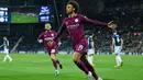 Pemain Manchester City, Leroy Sane saat merayakan gol. (AFP/Oli Scarff)