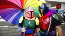 Cosplayer di Comic-Con San Diego tampil dengan dandanan sebagai Mandalorian. (Christy Radecic/Invision/AP)