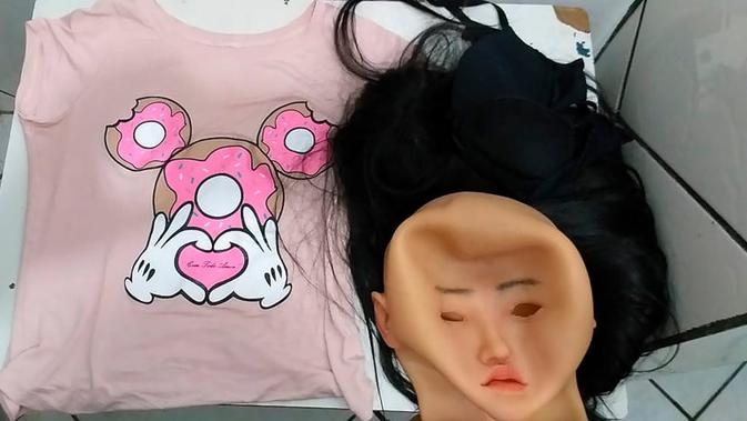 Clauvino da Silva mengenakan topeng silikon untuk kabur (Sumber: AP/Rio de Janeiro Penitentiary Administration Secretariat)