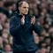 Pelatih kepala Timnas Inggris asal Jerman, Thomas Tuchel, mengamati para pemain dari pinggir lapangan selama pertandingan persahabatan antara Inggris dan Wales di Stadion Wembley, London, pada 9 Oktober 2025. (Ben STANSALL/AFP)