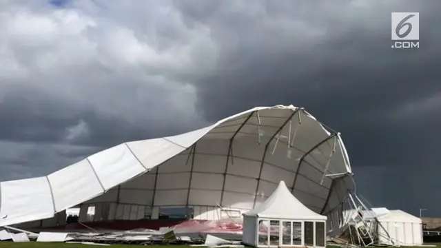Sebuah tenda raksasa terbang dalam sekejap akibat terkena dahsyatnya Topan Ali di St Andrews, Skotlandia.