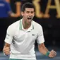 Petenis Serbia Novak Djokovic juara Australia Open setelah mengalahkan Daniil Medvedev asal Rusia dalam laga final di Rod Laver Arena, Melbourne, Minggu, 21 Januari 2021. (AP Photo/Andy Brownbill)