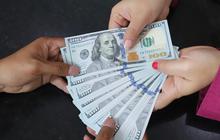 FOTO: Rupiah Menguat Tipis Namun Masih Bertahan di Level Rp 18 Ribu