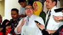 Razman Arif Nasution, menjawab pertanyaan wartawan di Bareskrim Mabes Polri, Jakarta, Rabu (11/3/2015). Kedatangan Razman Arif Nasution untuk melaporkan Gubernur DKI Jakarta Basuki Tjahaja Purnama atas pencemaran nama baik. (Liputan6.com/Yoppy Renato)