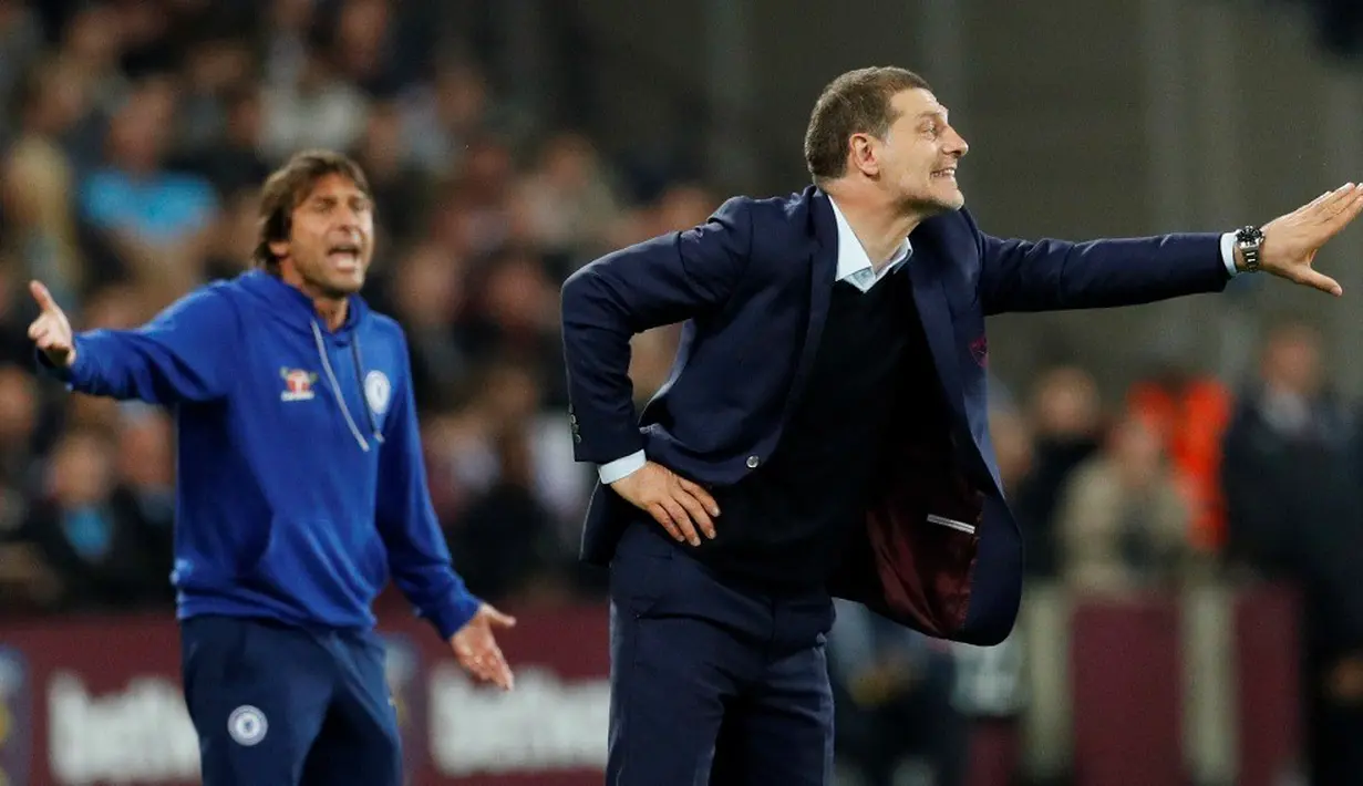 Ekspresi pelatih Chelsea, Antonio Conte, dan pelatih West Ham United, Slaven Bilic (kanan), dalam laga 16 besar Piala Liga Inggris 2016-2017 di Olympic Stadium, Rabu (26/10/2016) waktu setempat. (Action Images via Reuters/John Sibley)