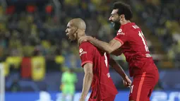 Gelandang Liverpool Fabinho merayakan gol pembuka untuk timnya yang dicetak ke gawang Villarreal pada leg kedua semifinal Liga Champions di Estadio de la Ceramica atau El Madrigal, Rabu (4/5/2022) dini hari WIB. Liverpool lolos ke final usai hampir kena comeback sebelum menang 3-2. (AP Photo/Alberto Saiz)