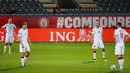 Para pemain Belarusia bereaksi saat melawan Belgia pada pertandingan Grup E kualifikasi Piala Dunia 2022 di Stadion King Power, Leuven, Belgia, Selasa (30/3/2021). Belgia menang 8-0. (AP Photo/Francisco Seco)