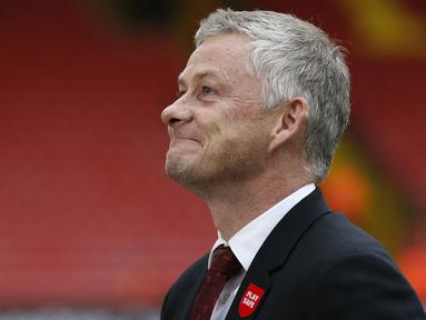 Ole Gunnar Solskjaer merupakan mantan striker MU yang mampu mempersembahkan 126 gol dari 366 pertandingan. Ia juga turut membantu MU meraih 12 trofi juara. Sayangnya, nasib gemilangnya tak berlanjut saat menjadi pelatih. Ia dipecat oleh mantan klubnya setelah performa buruk MU. (AFP/Ian Kington)