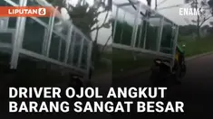 Aksi seorang driver ojek online mengangkut barang yang sangat besar mengundang perhatian