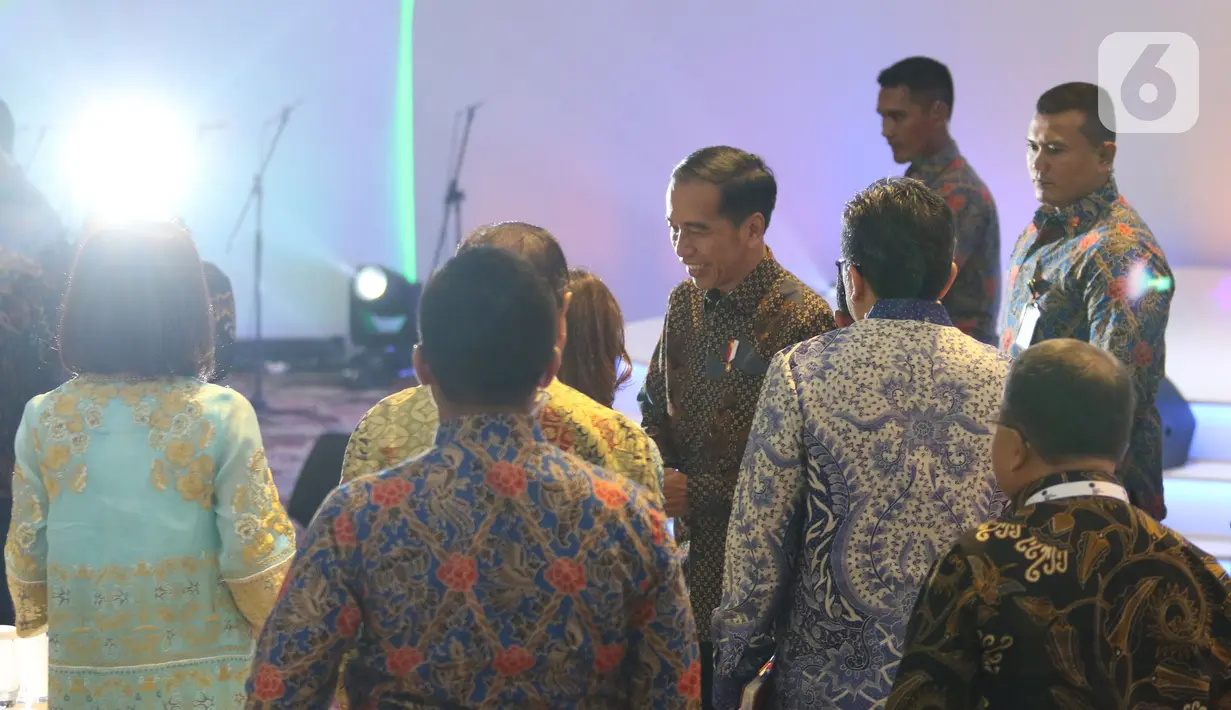 Presiden Joko Widodo tiba dalam acara Indonesia Banking Expo (IBEX) 2019 di Jakarta, Rabu (26/11/2019). IBEX 2019 untuk memberi rekomendasi terkait konsolidasi sektor keuangan dan bisnis fintech guna menciptakan ekosistem keuangan yang kuat, efektif dan efisien. (Liputan6.com/Angga Yuniar)