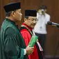 Hakim konstitusi Suhartoyo menjalani pelantikan menjadi Ketua Mahkamah Konstitusi (MK) di Ruang Rapat Pleno Hakim Konstitusi, Gedung MK Jakarta, Senin (13/11/2023). (Liputan6.com/Faizal Fanani)