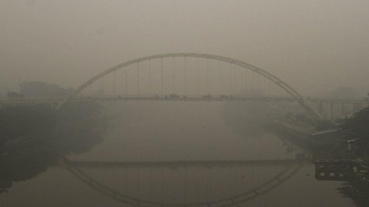 Beginilah pemandangan kabut asap semakin tebal selimuti Singapura