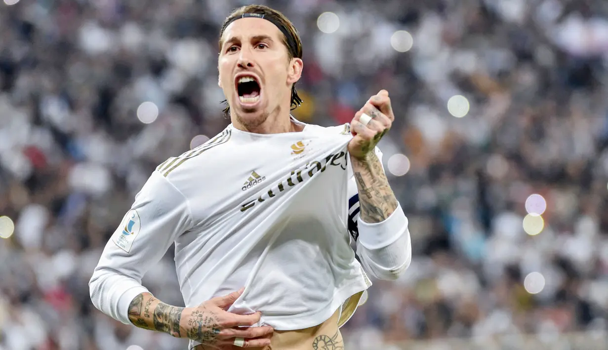 Real Madrid pada akhirnya mengambil keputusan berat terkait masa depan bek sekaligus kaptennya, Sergio Ramos. Mereka memastikan sang pemain tidak akan mengenakan seragam kebanggaan Los Merengues musim depan. (AFP/Fayez Nureldine)