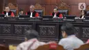 Sidang tersebut beragendakan mendengarkan keterangan dari Lembaga Manajemen Kolektif Nasional (LMKN), Persatuan Artis Penyanyi, Pencipta Lagu dan Pemusik Republik Indonesia (PAPPRI) dan pihak terkait Satrio Yudi Wahono (Piyu PADI) dkk. (Liputan6.com/Herman Zakharia)