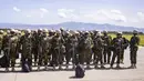 Penerjunan pasukan Kenya dilakukan hampir empat bulan setelah geng-geng anarkis meluncurkan serangan terkoordinasi untuk menyasar infrastruktur penting pemerintahan di ibu kota Haiti dan sekitarnya. (AP Photo/Marckinson Pierre)