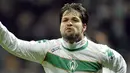 Werder Bremen's midfielder Diego celebrates after scoring during the Werder Bremen vs AC Milan UEFA Cup round of 32 match in Bremen February 18, 2009. The match ended 1-1. AFP PHOTO/JOHN MACDOUGALL