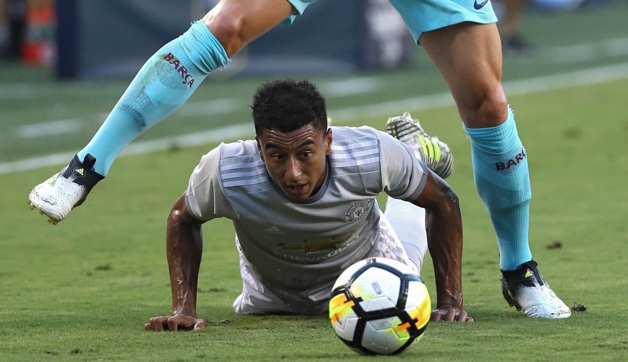 Jesse Lingard mencetak satu gol saat Manchester United bersua Real Madrid pada laga International Champions Cup. MU menang lewat adu penalti 2-1. (Patrick Smith/Getty Images/AFP)