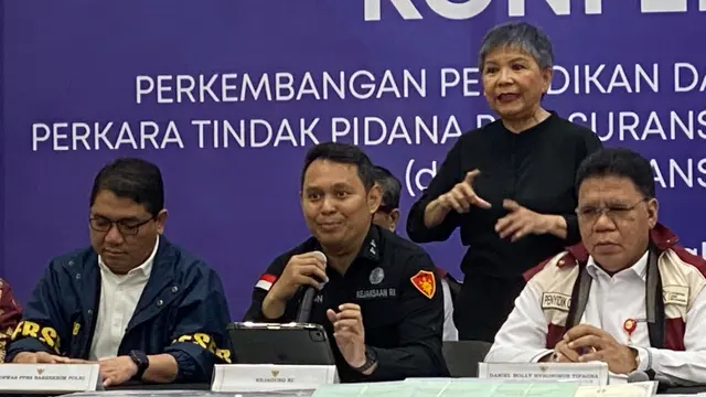 Subdirektorat Eksekusi dan Eksaminasi Direktorat D Jampidum Kejaksaan Agung, Achmad Muhtarom  di Kantor Otoritas Jasa Keuangan (OJK), Kamis (9/7/2026). (Liputan6.com/Christian)