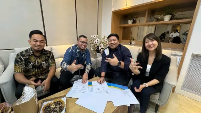 Ketua Umum Gekrafs Kawendra Lukistian dan CEO TourGuideIn Akmal Nahdi menjalin kerja sama memperkuat ekosistem ekonomi kreatif nasional.