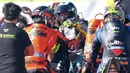Hingga bubaran, Ducati tetap mendominasi podium 1-3, sementara Valentino Rossi finis di tangga ke-10 MotoGP Valencia, race terakhir dalam kariernya. (AP Photo/Alberto Saiz)