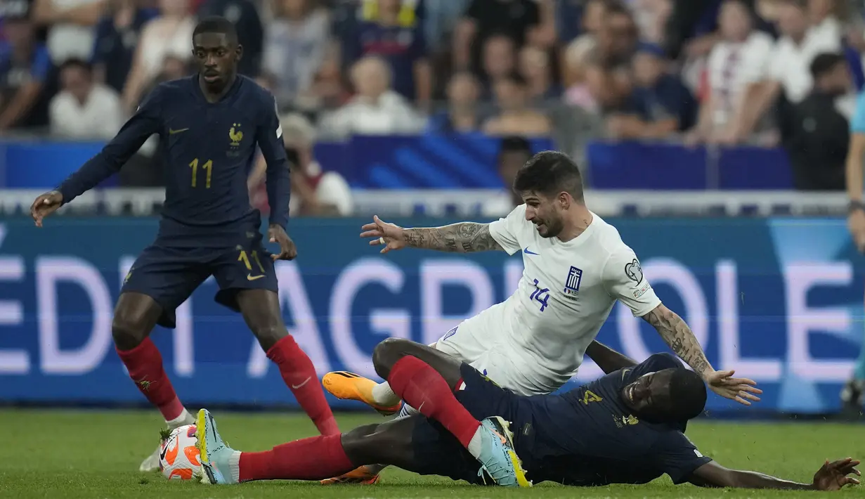 <p>Les Bleus berhasil mengatasi perlawanan Yunani dengan kemenangan tipis 1-0. (AP Photo/Christophe Ena)</p>