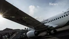 Pesawat Garuda di Bandara Adi Sucipto harus menunda penerbangan beberapa jam akibat adanya kerusakan. 