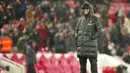 Ekspresi bahagia pelatih Liverpool, Jurgen Klopp di tengah guyuran hujan saat laga lanjutan Liga Inggris 2023/2024 di Anfield, Liverpool, Inggris, Selasa (02/01/2024) dini hari WIB. (AP Photo/Jon Super)