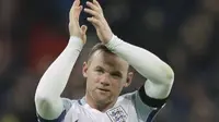 Wayne Rooney saat tampil pada kualifikasi Piala Dunia 2018 usai timnya mengalahkan Skotlandia 3-0 di Stadion Wembley, (11/11/2-16). Rooney memutuskan pensiun pada 23 Augustus 2017. (AP/Matt Dunham/File)