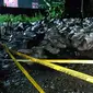 Batu Hitam hasil tambang warga Kecamatan Suwawa Timur dipasangi garis polisi (Arfandi Ibrahim/Liputan6.com)