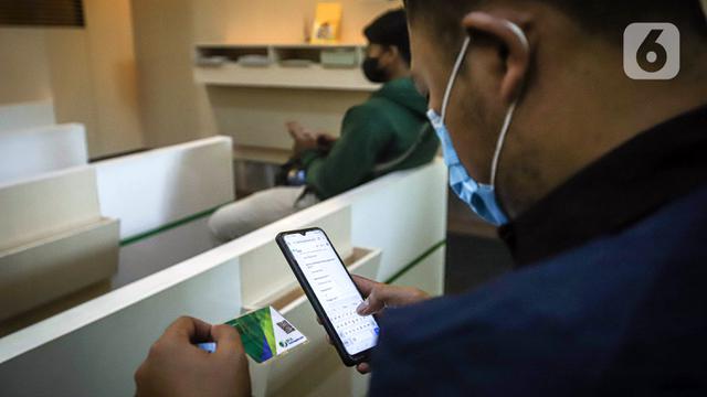 FOTO: Pencairan JHT Sebelum Aturan Baru Diberlakukan