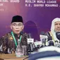 Ketua Umum Pengurus Besar Nahdlatul Ulama (PBNU) Yahya Cholil Staquf dan Perwakilan Muslim World League (MWL) atau Liga Muslim Dunia dalam acara Forum Religion 20 (R20) di Bali. (Dok. Liputan6.com/Muhammad Radityo Priyasmoro)