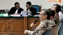 Deputi Gubernur BI, Halim Alamsyah hadir sebagai saksi dalam sidang lanjutan dugaan korupsi pemberian FPJP dan penetapan Bank Century sebagai bank gagal dengan terdakwa Budi Mulya, Senin (14/4/2014). (Liputan6.com/Johan Tallo)