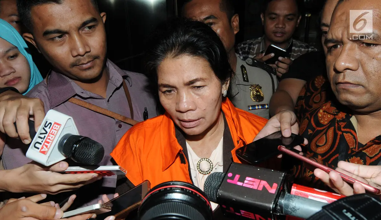 Merry Purba resmi ditetapkan tersangka dan ditahan KPK terkait suap putusan penanganan perkara dipengadilan Tipikor Medan.(merdeka.com/Dwi Narwoko)
