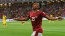 Timnas Indonesia boleh bangga setelah memastikan langkah ke semifinal Piala AFF 2020 sebagai juara Grup B. Irfan Jaya benar-benar tampil agresif dan membuat mental timnas Indonesia bangkit saat mengalahkan Malaysia. (AFP/Roslan Rahman)