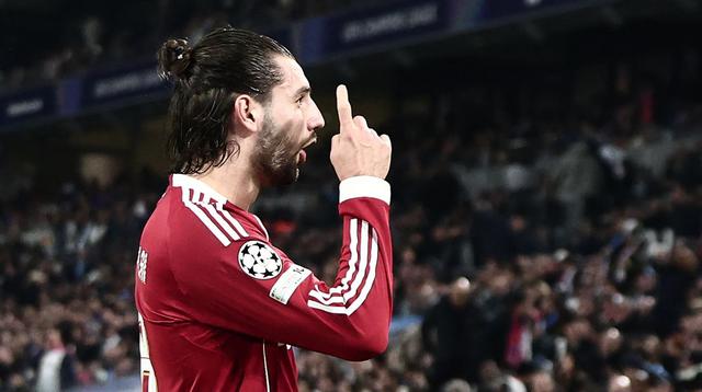 Gelandang Liverpool, Dominik Szoboszlai, berselebrasi setelah mencetak gol ke gawang Marseille dalam laga matchday ketujuh Liga Champions 2025/2026, Kamis (22/1/2026) dini hari WIB. (Thibaud MORITZ / AFP)