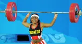 Dunia olahraga Indonesia tengah berduka setelah legenda angkat besi Lisa Rumbewas meninggal dunia. Lisa Rumbewas dikabarkan tutup usia di RSUD Jayapura, Papua, pada Minggu (14/1/2024) sekitar pukul 03.00 WIT. (AFP/Jung Yeon-Je)