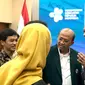 Ketua Ikatan Dokter Indonesia (IDI) Adib Khumaidi (tengah) menyampaikan bahwa 24 dokter dan beberapa tenaga kesehatan yang bertugas di Yahukimo, Wamena, Papua sedang berada dalam situasi kerusuhan saat ditemui di acara Public Hearing RUU Kesehatan Bersama Menteri Kesehatan dengan Dinkes Seluruh Indonesia, IDI, dan PDGI pada Jumat (17/3/2023). Foto: (Liputan6.com/Ade Nasihudin).