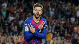 1. Gerard Pique (33 tahun) - Gerard Pique menjadi pemain paling tua di skuad utama Barcelona pada musim ini. Pemain asal Spanyol ini telah menginjak usia 33 tahun. (AFP/Pau Barrena)