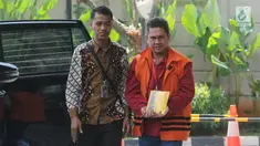 Kepala Kantor Imigrasi Kelas I Mataram, Kurniadie tiba di Gedung KPK, Jakarta, Selasa (18/6/2019). Kurniadie diperiksa sebagai tersangka terkait dugaan suap tentang penyalahgunaan izin tinggal warga negara asing di lingkungan kantor Imigrasi Nusa Tenggara Barat Tahun 2019. (merdeka.com/Dwi Narwoko)