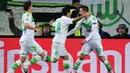 Juara grup B, Wolfsburg. Klub asal Jerman ini memberikan kejutan lolos usai menaklukan Manchester United. (AFP/John Macdougall)