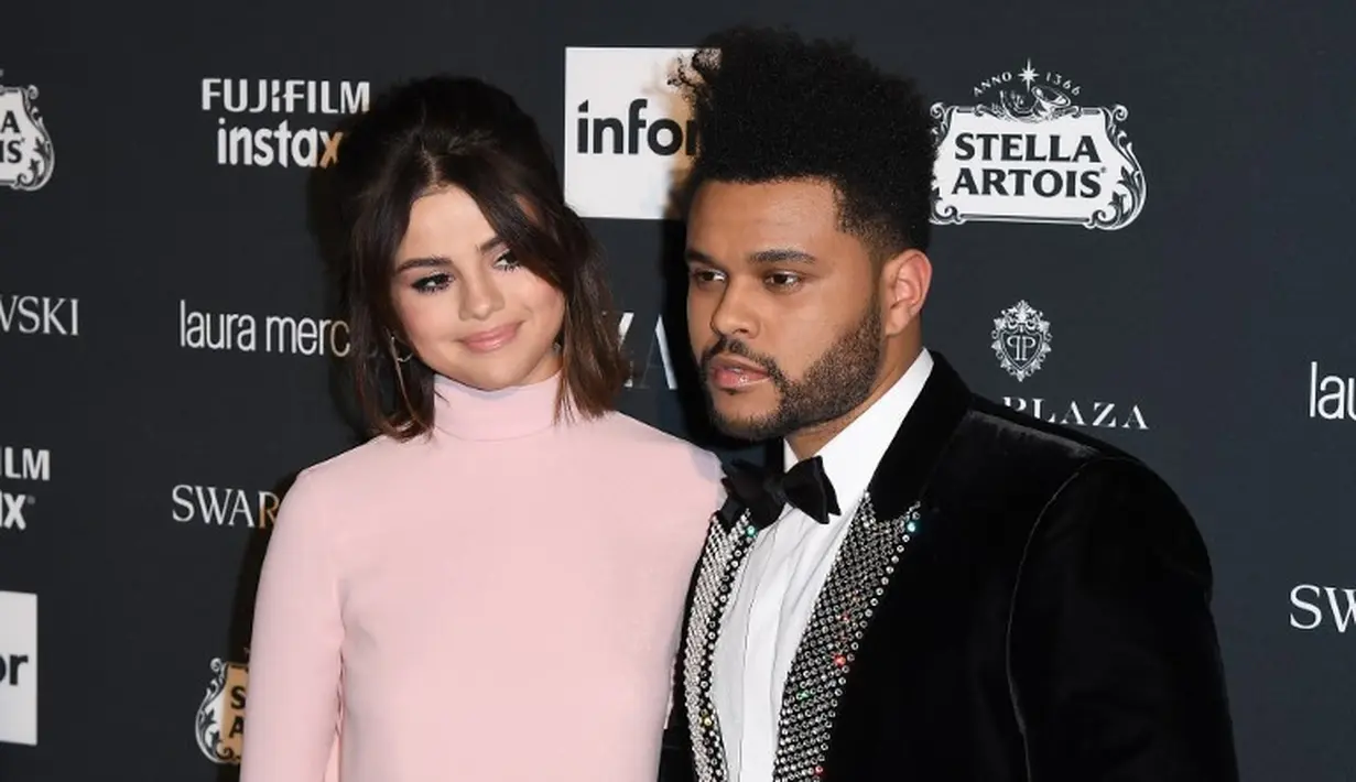 Sementara itu, usai putus dari The Weeknd, Selena Gomez sendiri pun kini kembali ke pelukan Justin Bieber. (Angela Weiss/AFP)