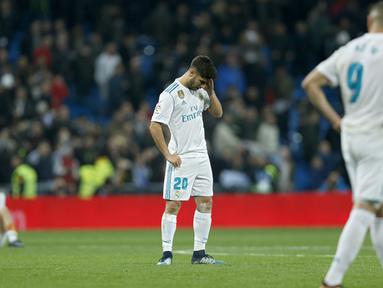 Ekspresi para pemain Real Madrid setelah timnya kalah dari Leganes pada perempat final Copa del Rey di Santiago Bernabeu stadium, Madrid, (24/1/2018). Leganes menang 2-1. (AP/Francisco Seco)