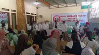 Relawan Buruh Sahabat Pram-Doel Gelar Kegiatan Tebus Murah Sembako di Jakbar