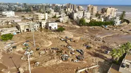 Menurut otoritas ambulans di Derna, kota di Libya yang paling parah terkena dampaknya, setidaknya 2.300 orang tewas dalam musibah ini. (AP Photo/Jamal Alkomaty)