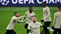 PSG akan bersua AC Milan dalam laga keempat Grup F Liga Champions 2023/2024 yang digelar di San Siro pada Rabu (8/11/2023) dini hari WIB. (GABRIEL BOUYS / AFP)