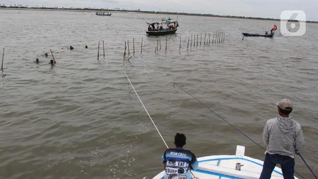 Secara Serentak, Ribuan Personel Gabungan Bersama Nelayan Bongkar Pagar Laut di Tangerang