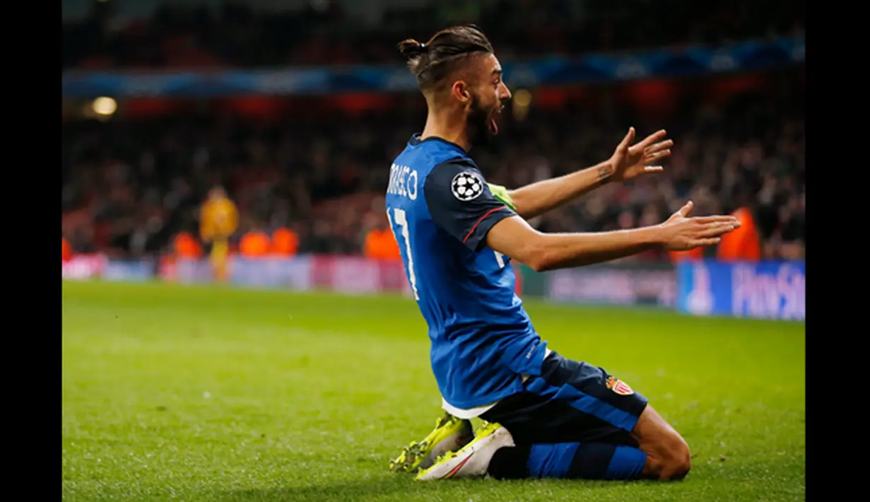 Pemain Tengah AS Monaco, Yannick Ferreira Carrasco melakukan selebrasi usai mencetak gol di laga 16 besar Liga Champions di Emirates Stadium, London, (25/2/2015). AS Monaco unggul 3-1 atas Arsenal. ( Reuters/John Sibley)