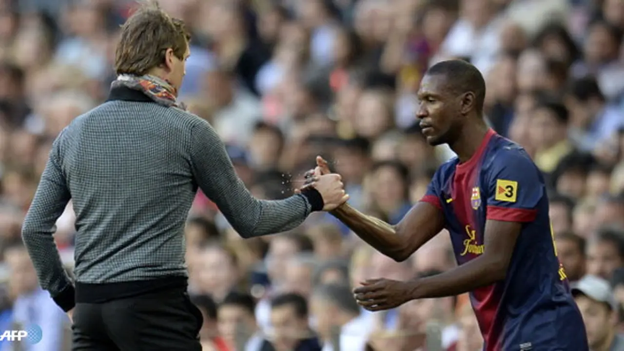tito-vilanova-eric-abidal-130602a.jpg